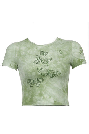 Green crop top featuring 90s butterfly aesthetic.