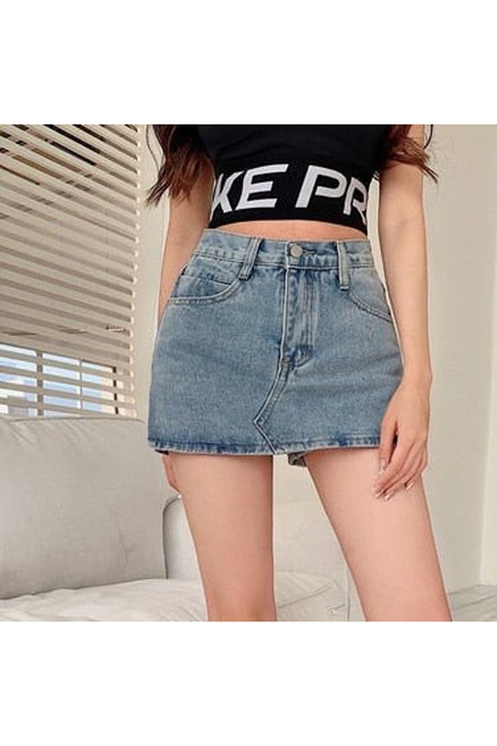 Blue 90s high waist denim mini skirt.