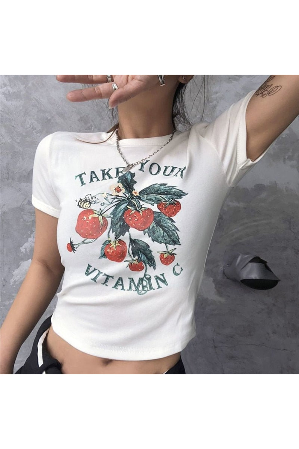 Vintage strawberry crop top in crisp white.