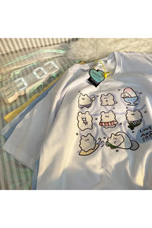 Cute white Doodle Animal Tee, playful design.