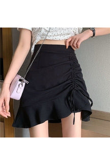 Stylish black pleated skirt with irregular design.