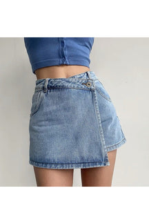 Asymmetrical denim mini skirt in striking blue shade.