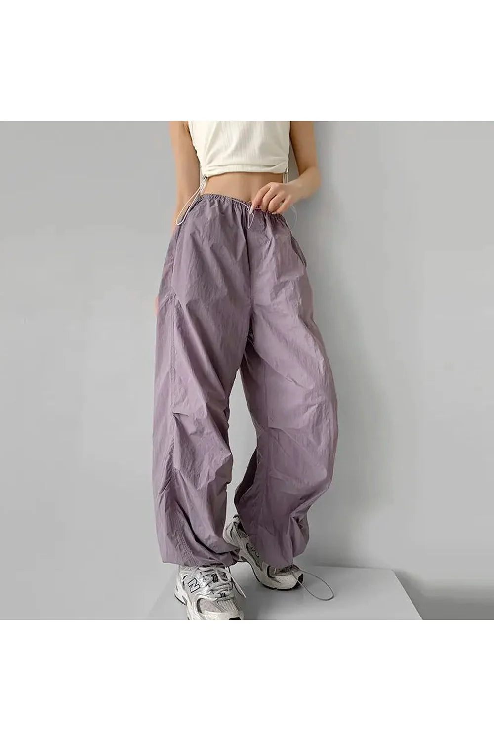 Black Baggy Lilac Parachute Pants: Stylish and versatile.