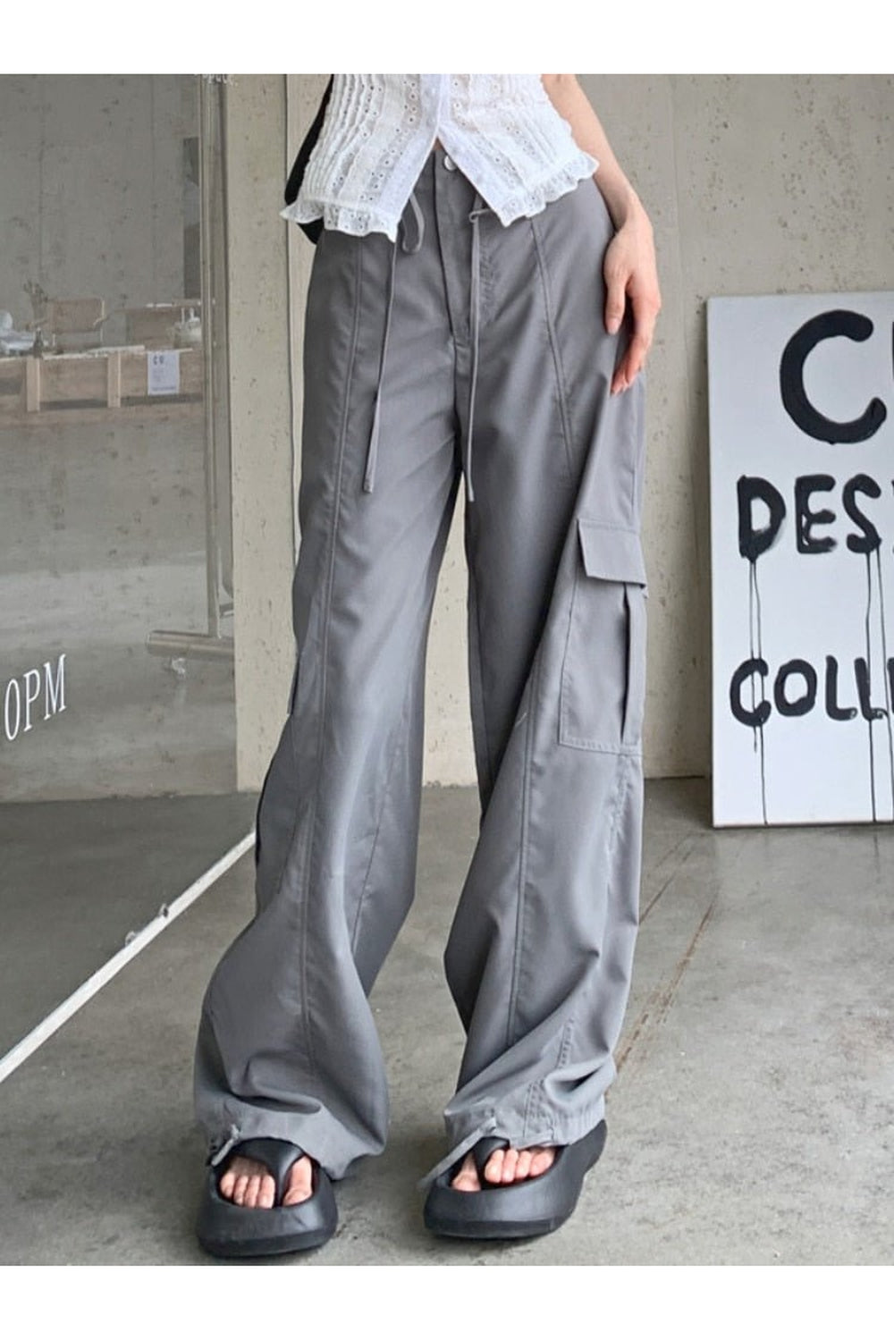 Baggy Vintage Cargo Pants in Gray, showcases retro style.