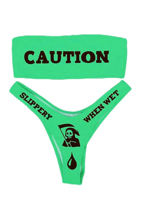 Bikini "CAUTION" in variant B, striking design.