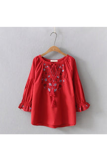 Red Bohemian Flare Sleeve Blouse with stylish details.