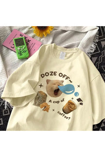 Apricot Caffeine Dreams t-shirt with cozy design.