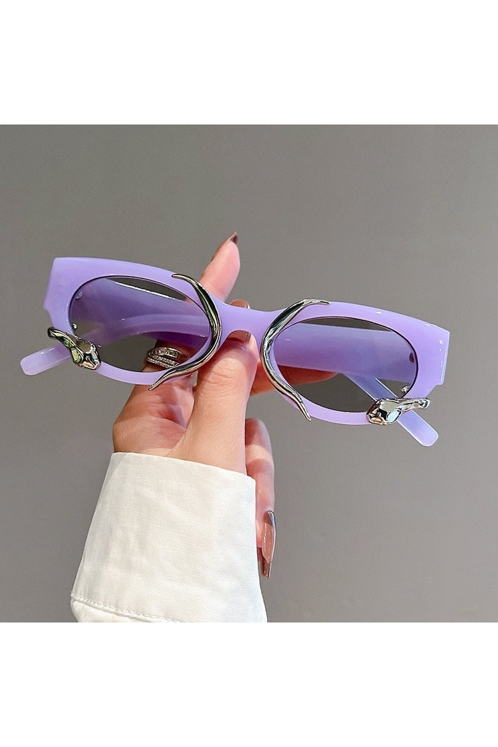 Stylish Cat Eye Snake Wrapped Sunglasses in purple-grey.