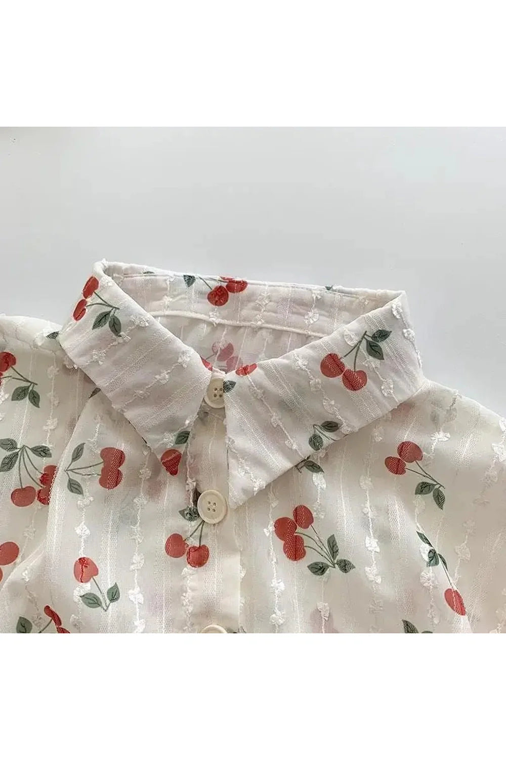 Cherry Blossom Button-Up Blouse in Beige, floral pattern.