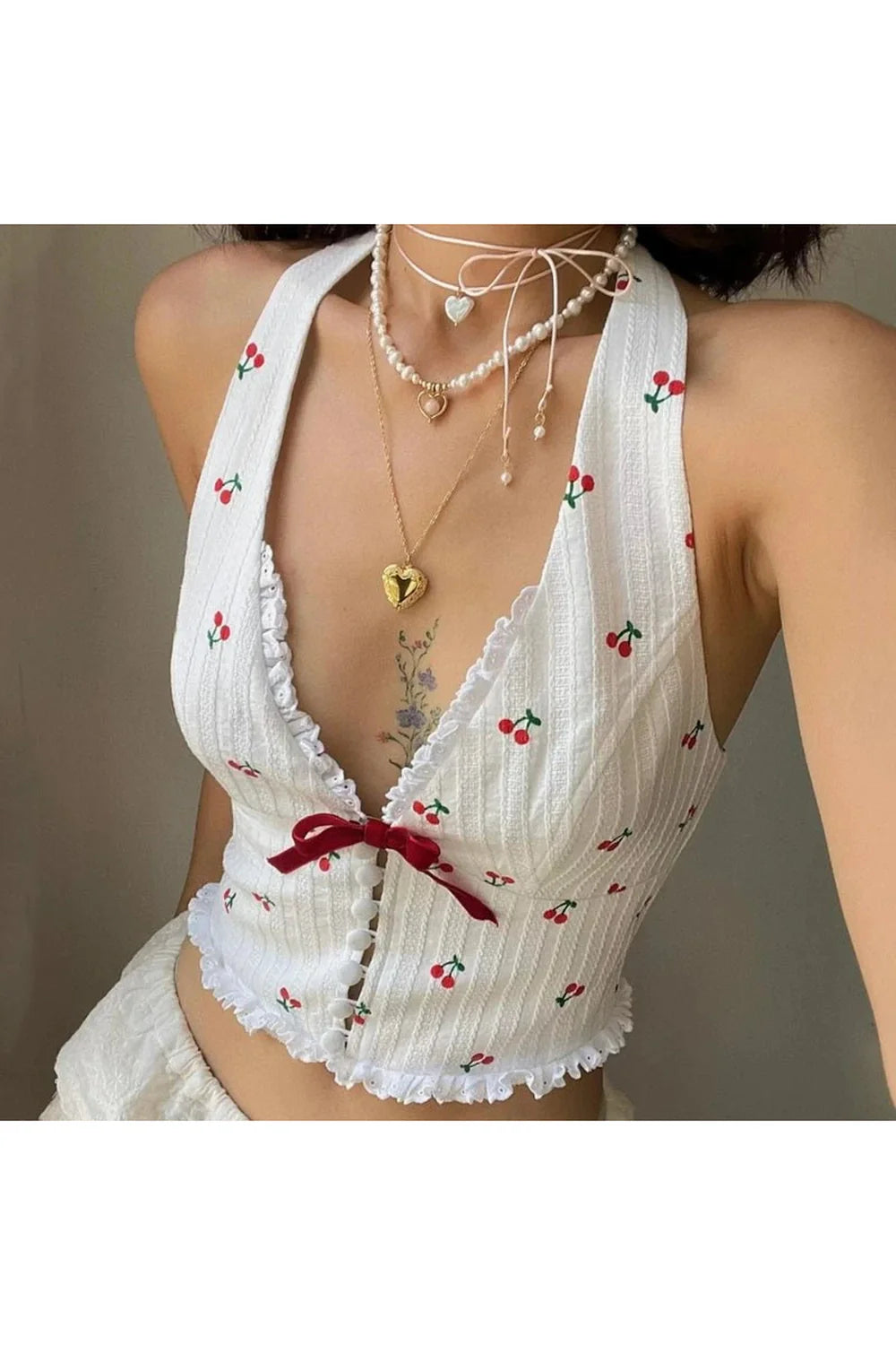 White Cherry Blossom Lace-Up Halter Top radiates elegance.