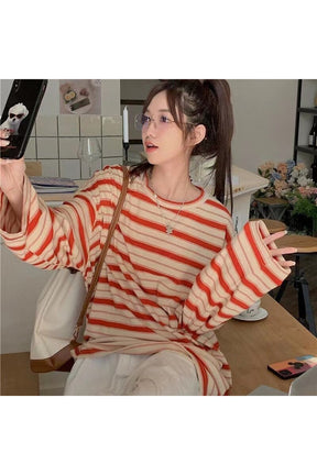 Stylish red striped unisex long sleeve shirt.