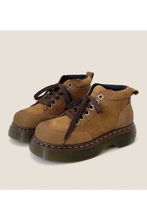 Chunky Brown Leather Lace-Up Boots variant 1: Sturdy and fashionable lace-up footwear.