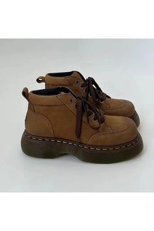 Chunky Brown Leather Lace-Up Boots variant 1: Sturdy and fashionable lace-up footwear.