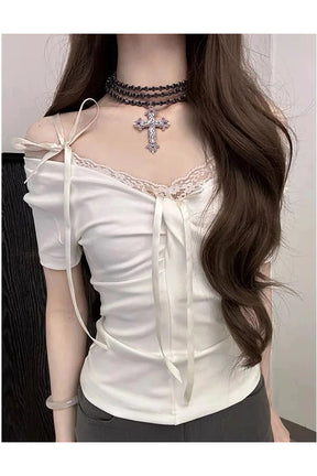 White Coquette Lace Up Tops: Fashionable and elegant.