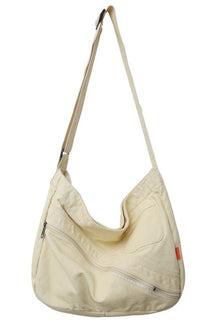 Beige cotton shoulder bag with large capacity.