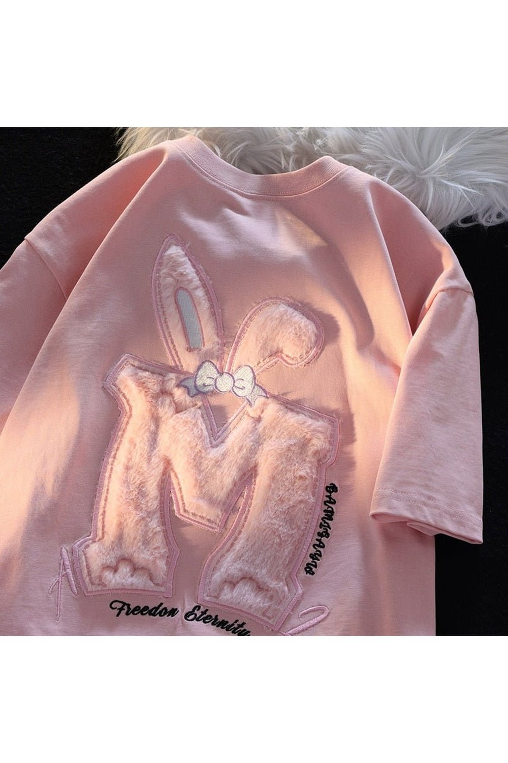 Pink Cotton Rabbit Ear T-shirt: Playful and charming.