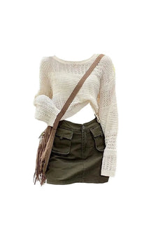 Stylish Boho Chic crochet sweater and olive skirt.