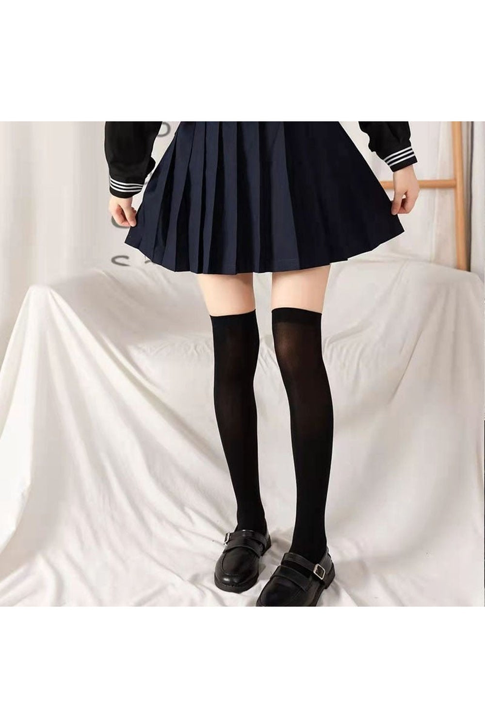 Solid black Cross Cosplay Stockings: sleek and versatile.