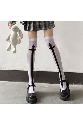 White cross adds detail to cosplay stockings.