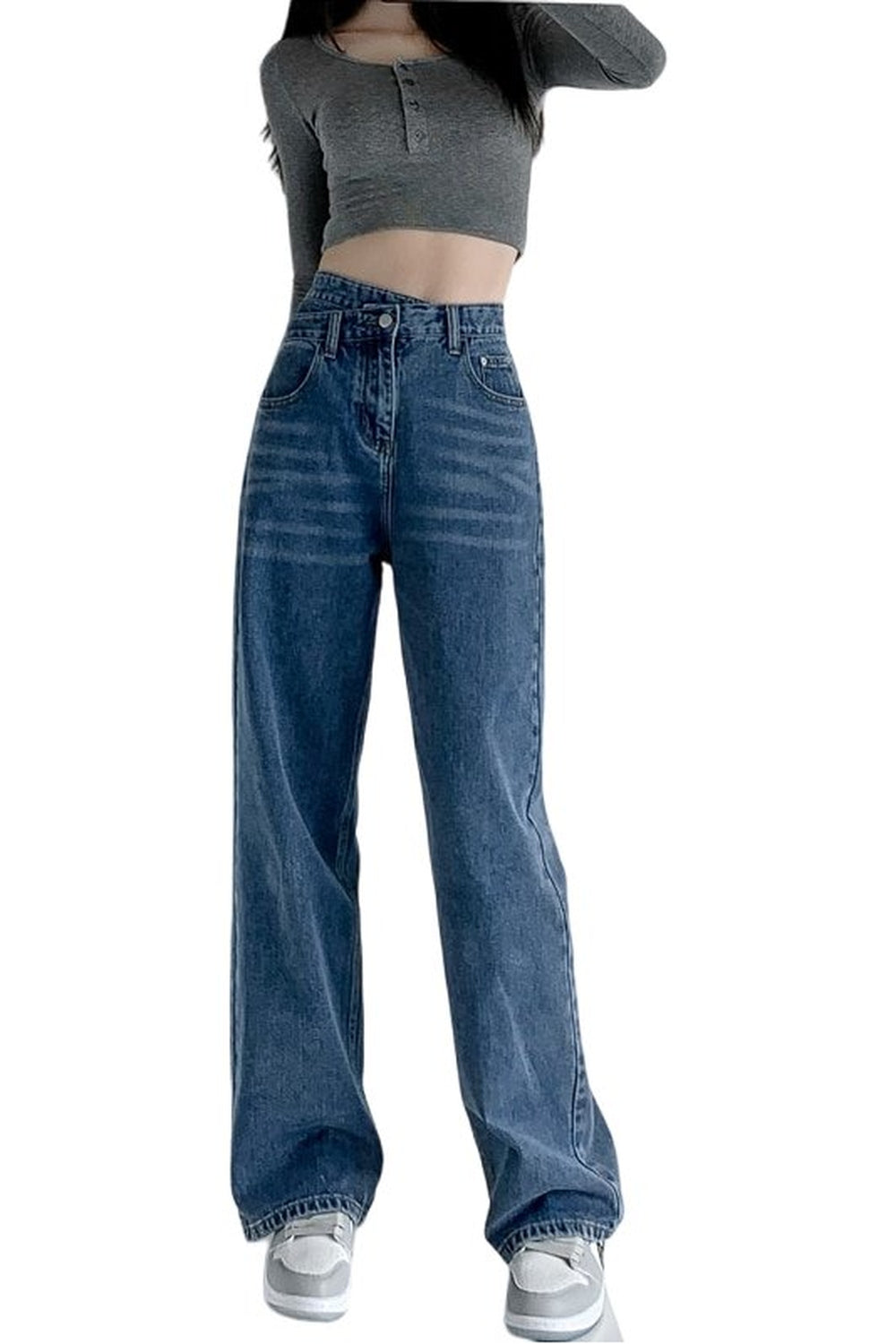 Baggy black jeans with cross waist detail.