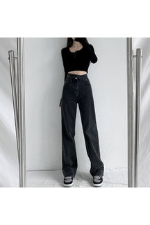 Baggy black jeans with cross waist detail.