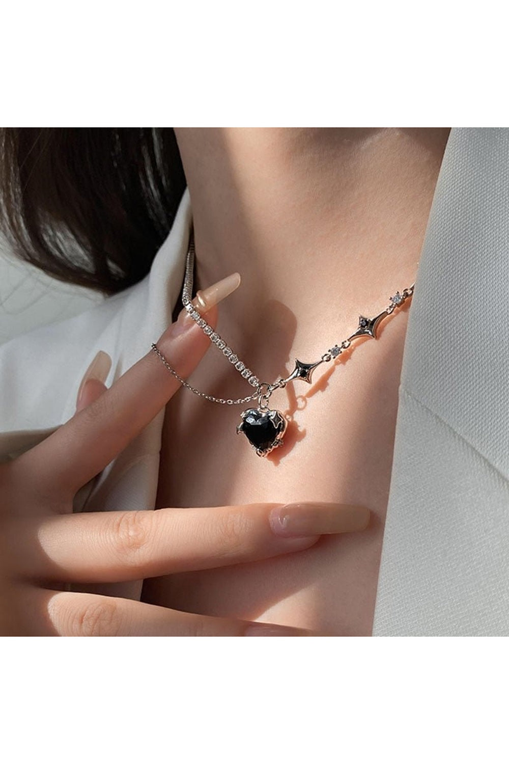 Gothic Crystal Heart Necklace Variant 2 shines elegantly.