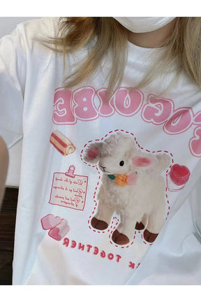 Adorable white T-shirt featuring cute lamb graphic.