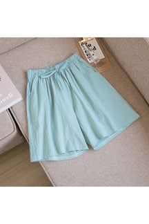 Cute Pea Green shorts in cotton linen blend.