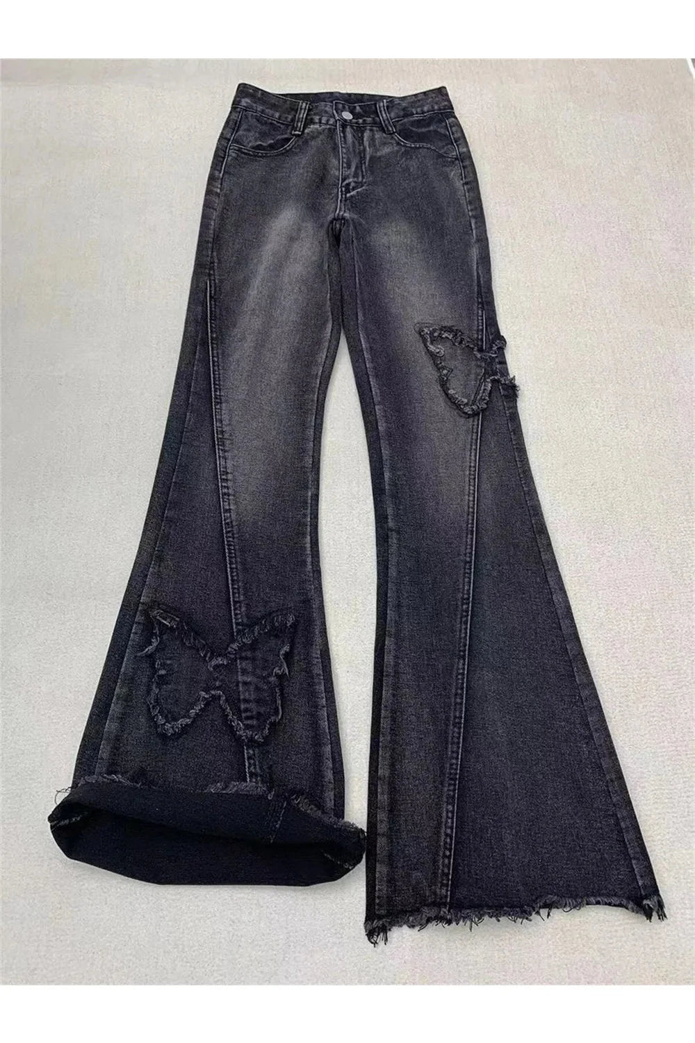 Stylish black Dark Butterfly Flare Jeans with flair.