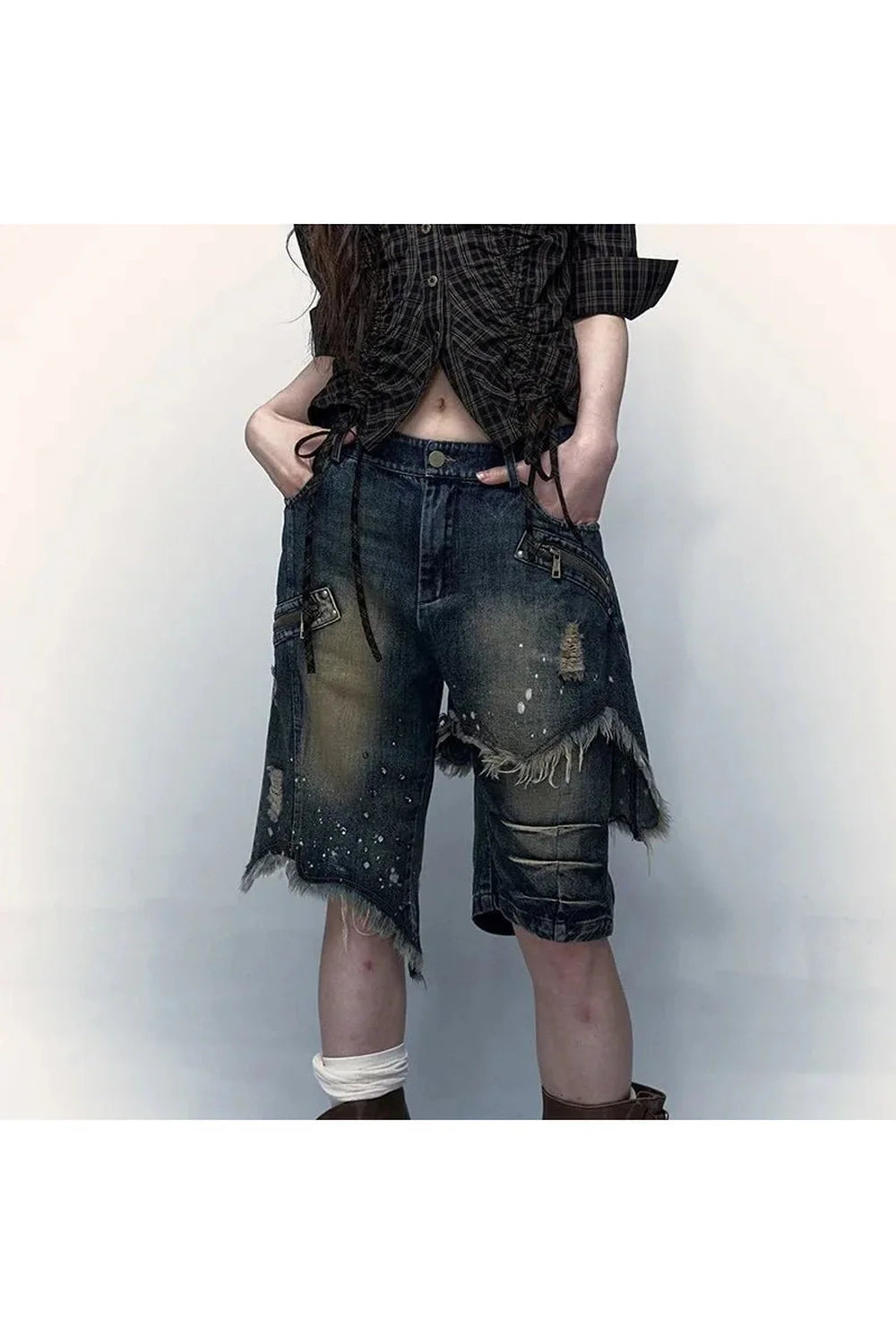 Stylish Distressed Denim Bermuda Shorts for a grunge look.