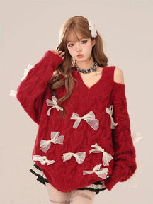 Cozy red sweater with charming bow tie.