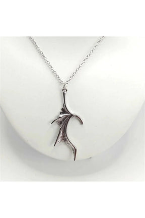 "Duality Bat Wing Heart Necklace variant A shines."