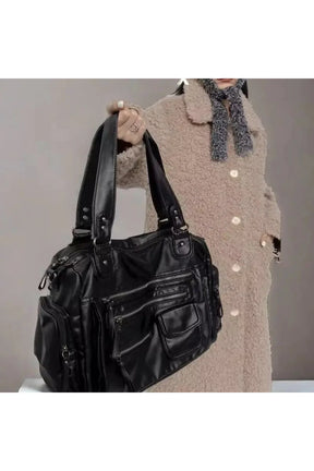 Stylish black Edgy Multi-Pocket Handbag with versatility.