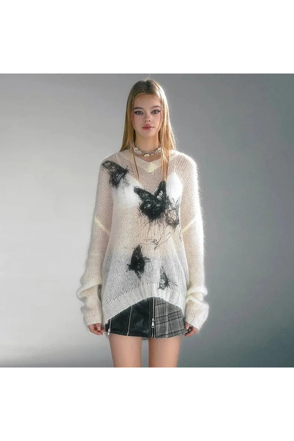 White Ethereal Butterfly Knit Sweater with grace.