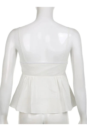 White Ethereal Peplum Top, delicately flowing design.