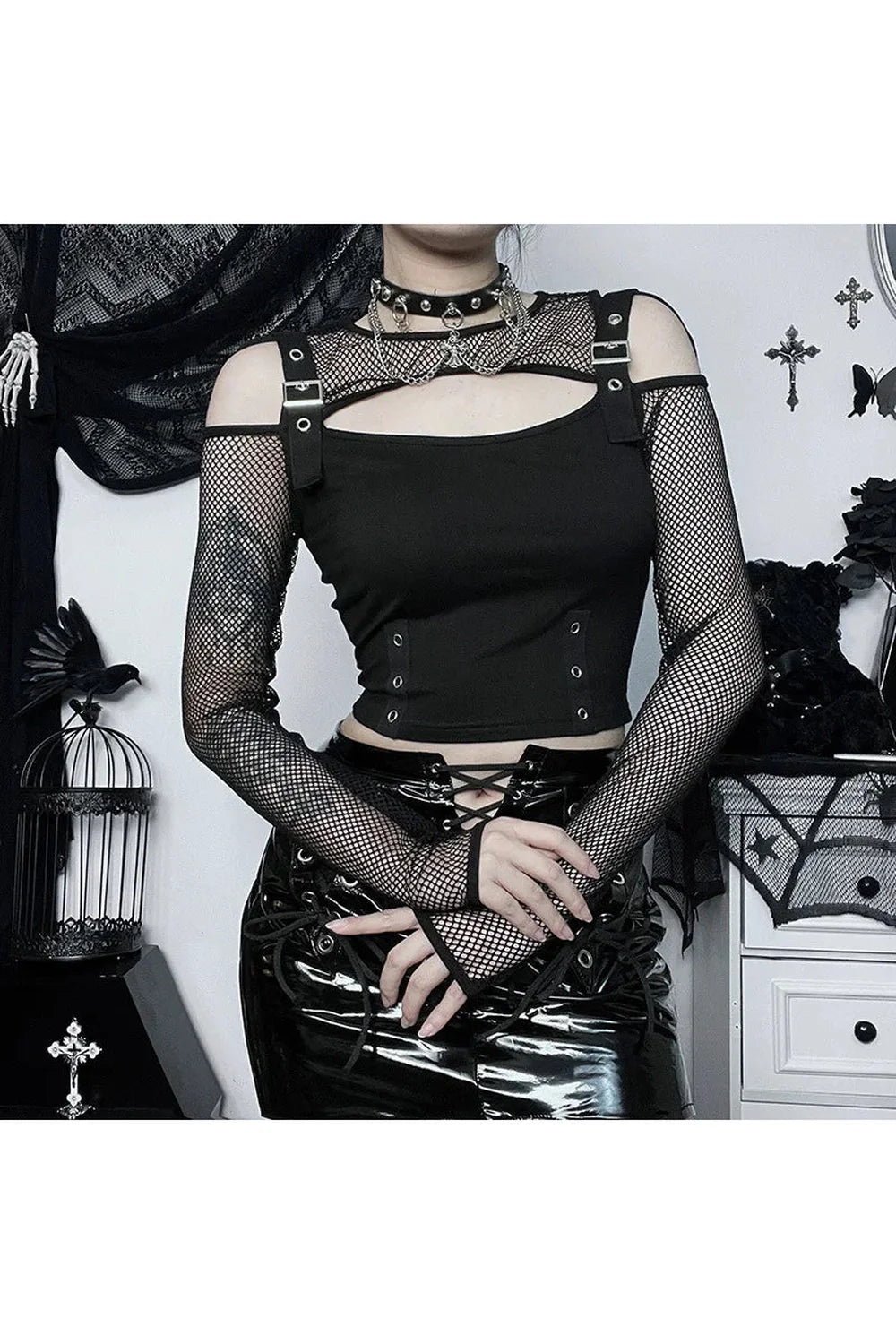 Edgy black fishnet patchwork crop top.