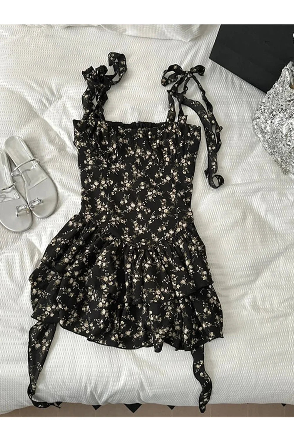 Black Floral Ruffle Tie-Strap Dress with elegance.