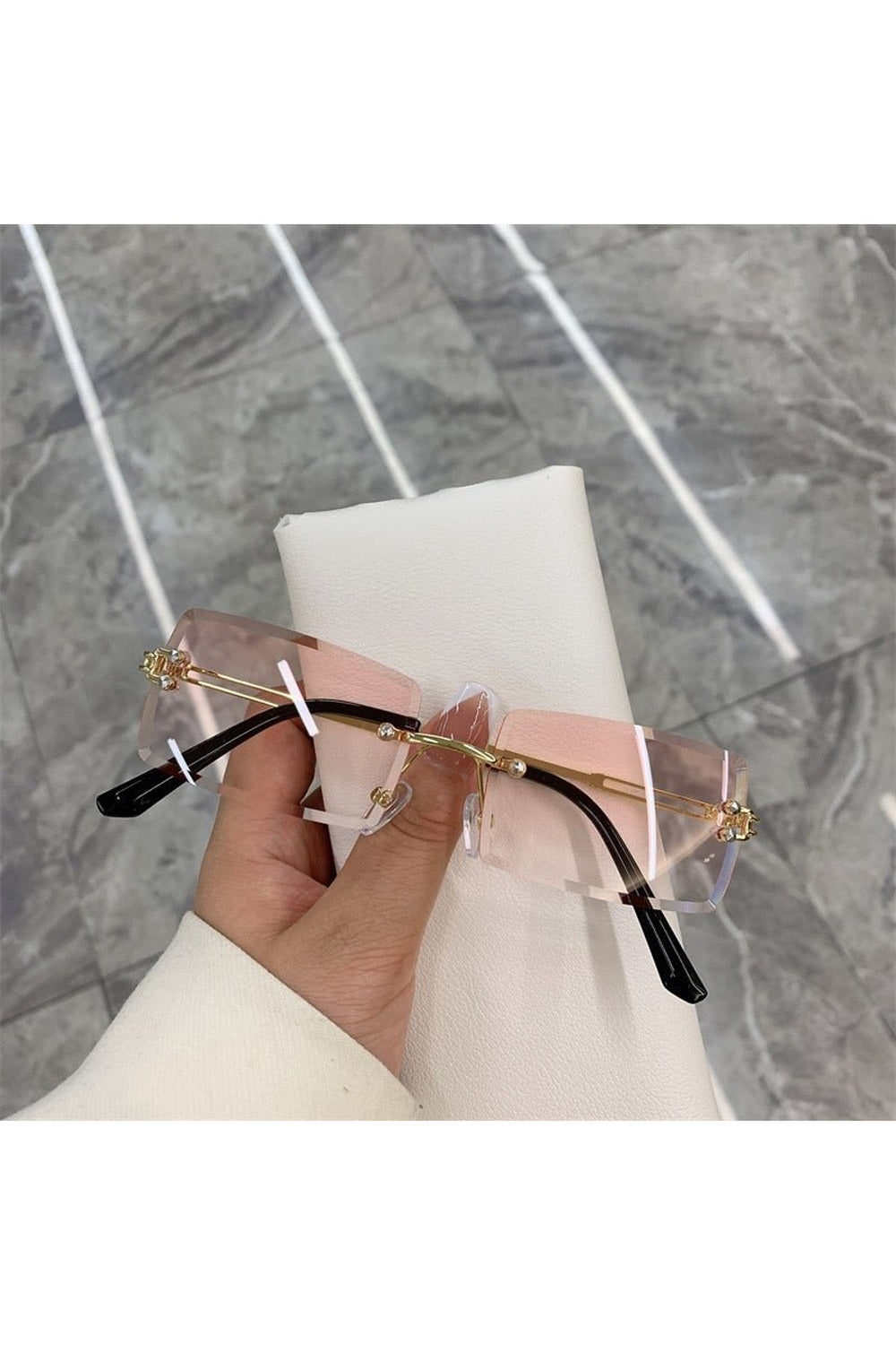 Sleek gold gradient pink frameless rectangle shades.