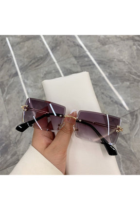 Chic frameless rectangle shades in Gold Purple.