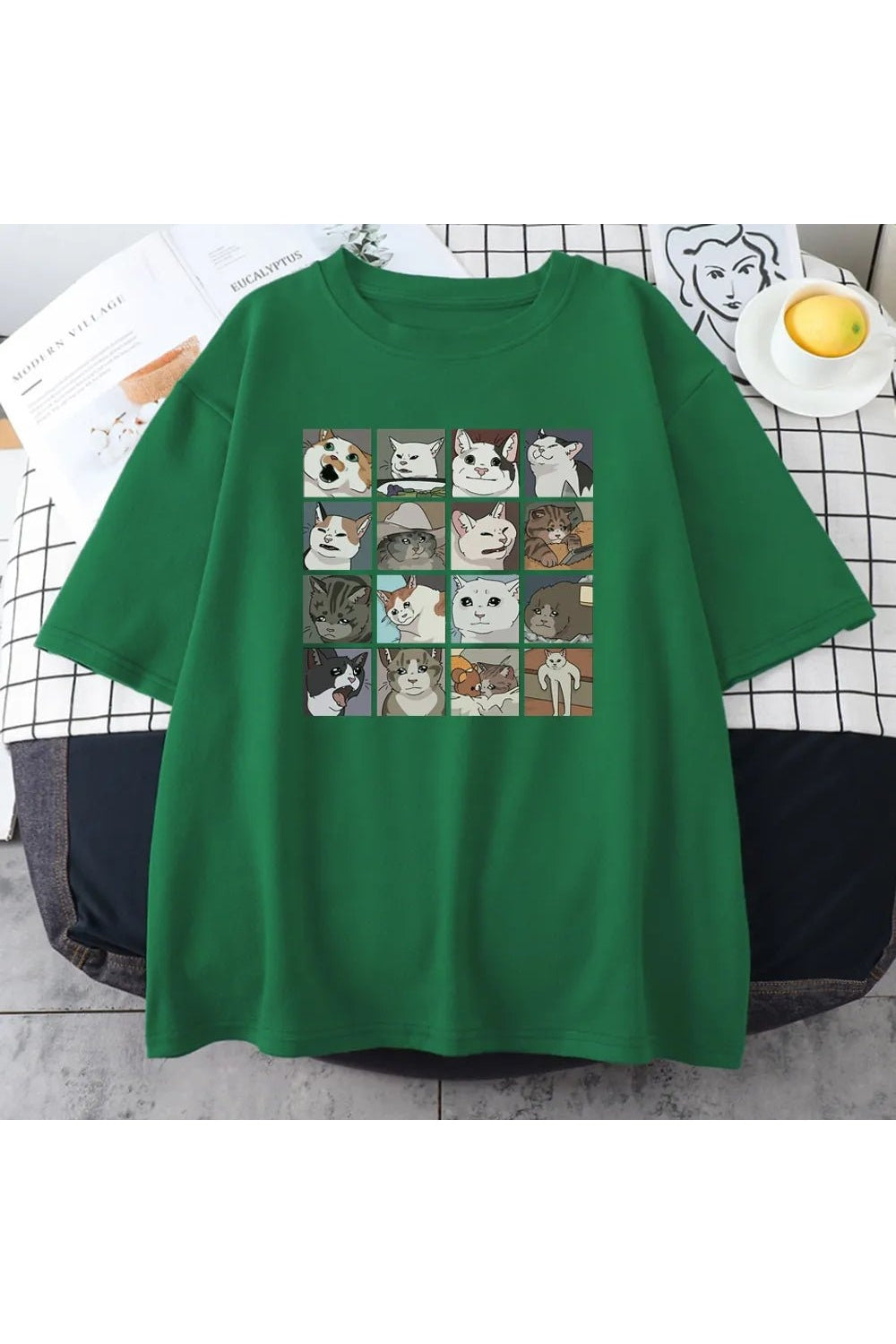 Oversize green T-shirt featuring funny cat meme.