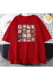 Oversized red t-shirt with funny cat meme.