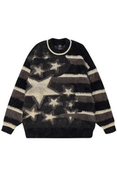 Cozy black sweater with fuzzy galaxy star design.