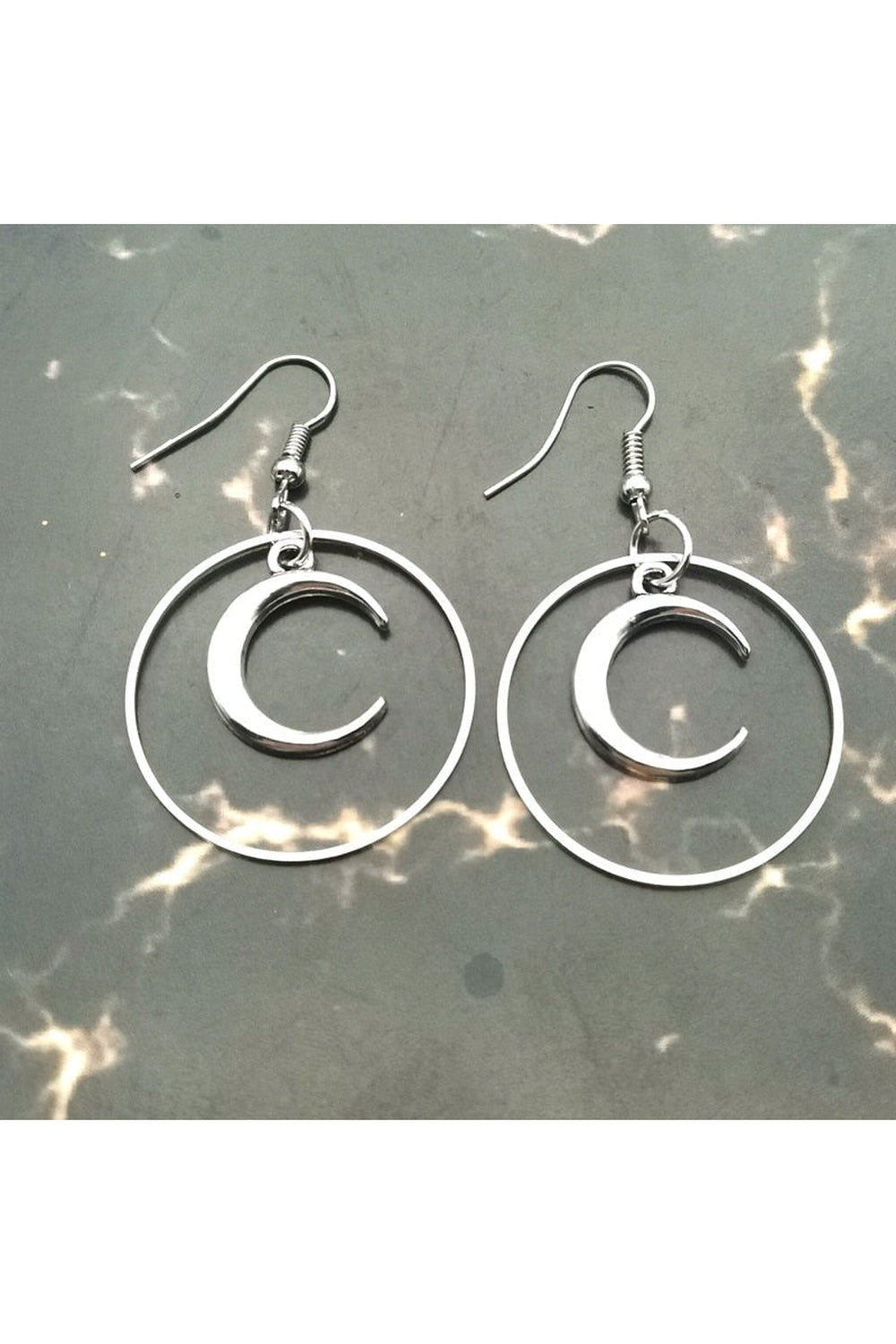 Elegant Gothic Crescent Earrings variant 1 in silver.