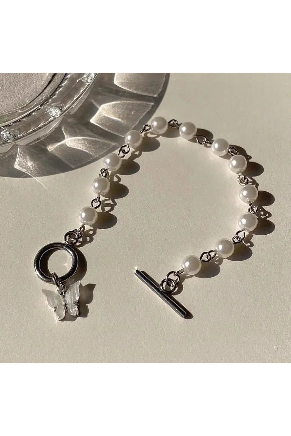 Layered bracelet with gothic cross charm (s316).