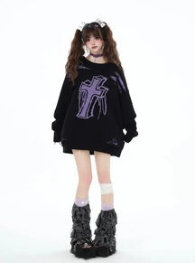 Distressed black sweater with gothic cross design.