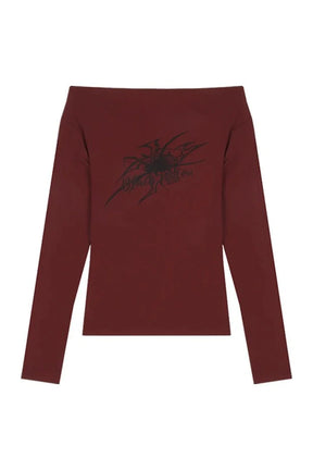 Off-shoulder crop top in burgundy, gothic style.