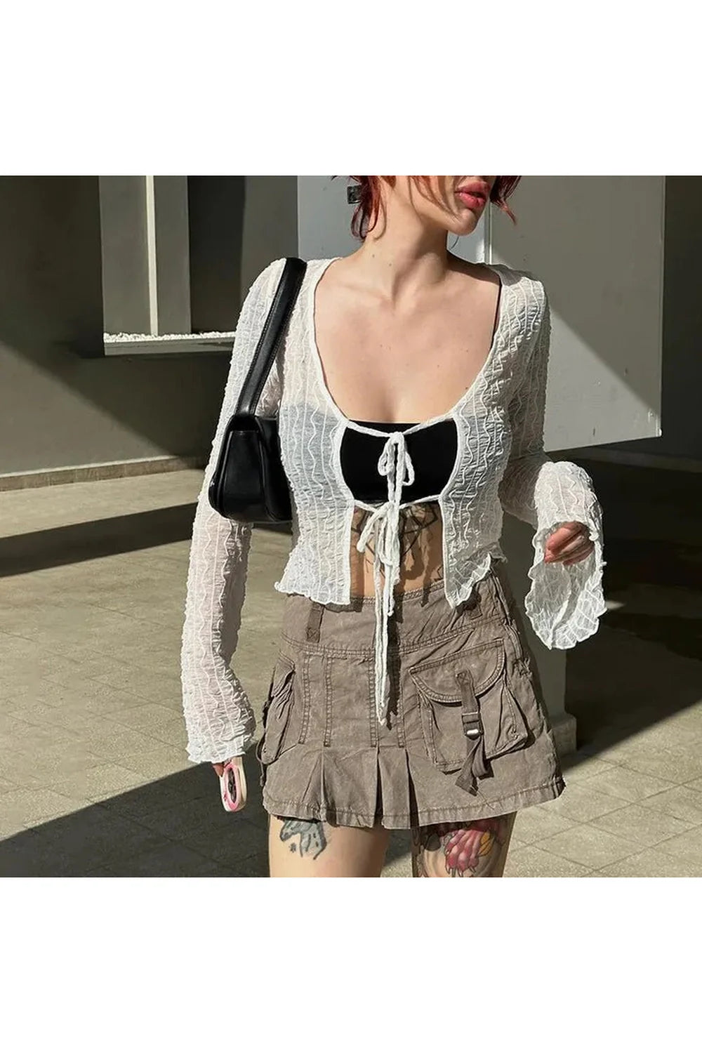 White Gothic Lace Up Blouse with intricate design.