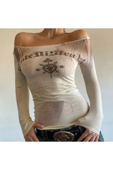 Sheer apricot tee with gothic graphic design.