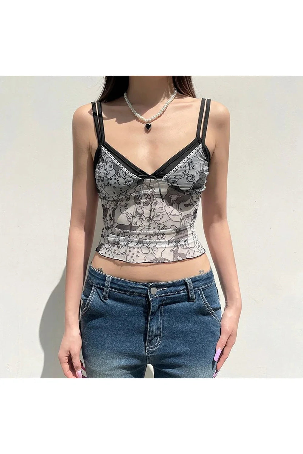 Black Graffiti Mesh Crop Top: edgy style.