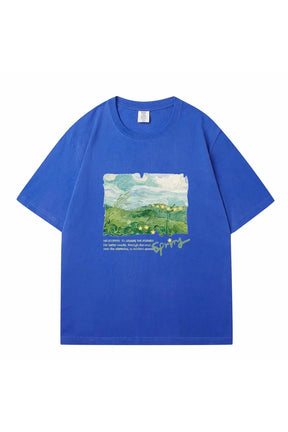 Blue oversized street t-shirt with green print.